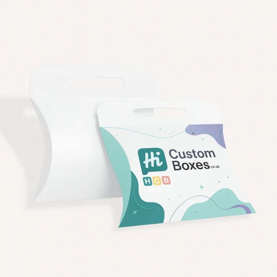 Plain white pillow box and printed box with a handle- featuring an abstract blue-purple design- class=